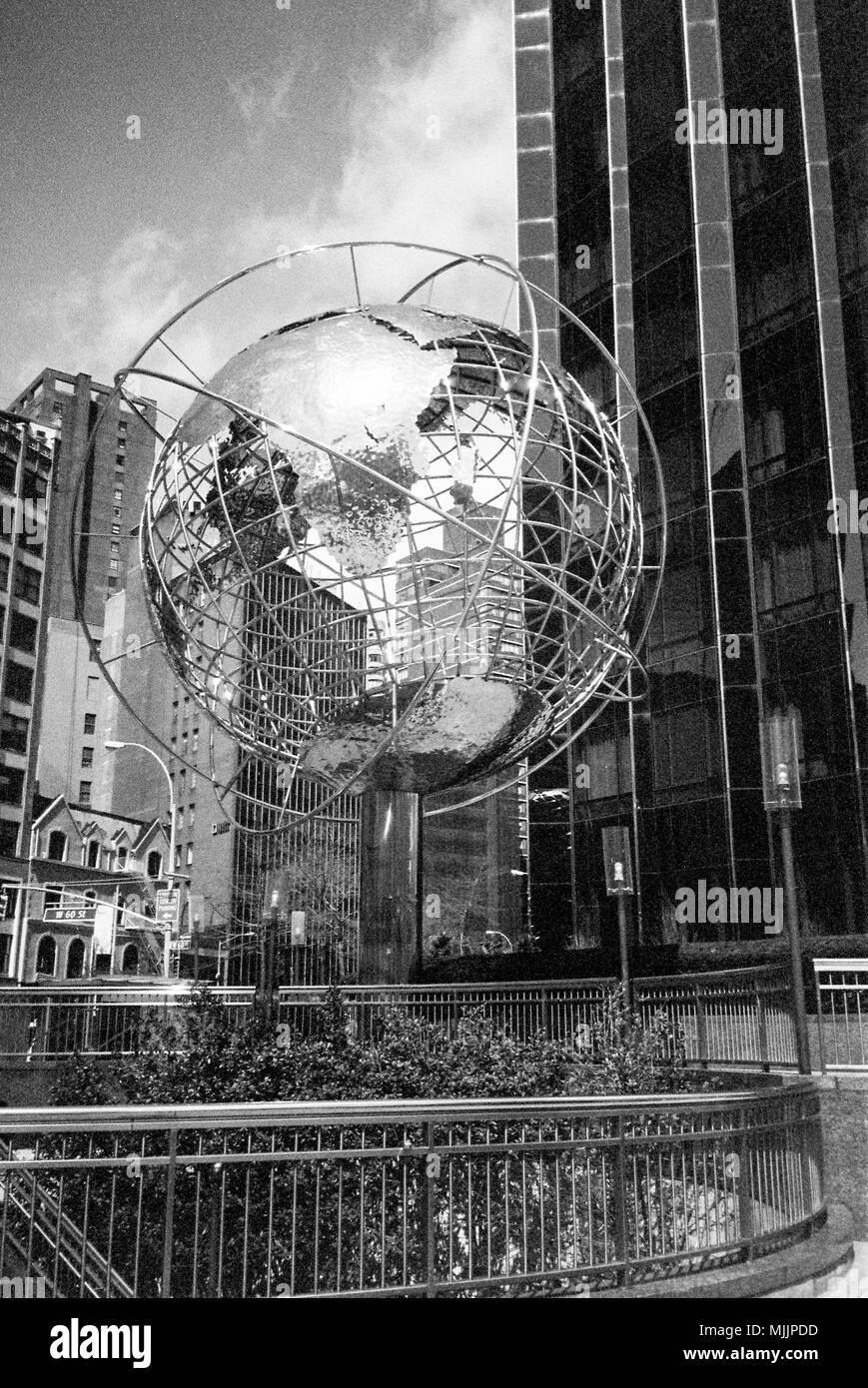Stainless steel globe at Columbus Circle outside Trump International Hotel,  Manhattan, New York City, United States of America. Stock Photo