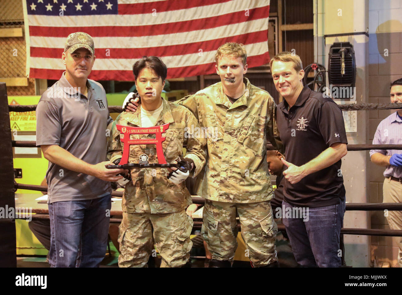 Staff Sgt Michael Ngchie Assigned To 1st Battalion 1st Special Forces Group Airborne Receives An Award As The Winner Of The Lightweight Championship Bout During The 10th 1st Battalion 1st Special Forces