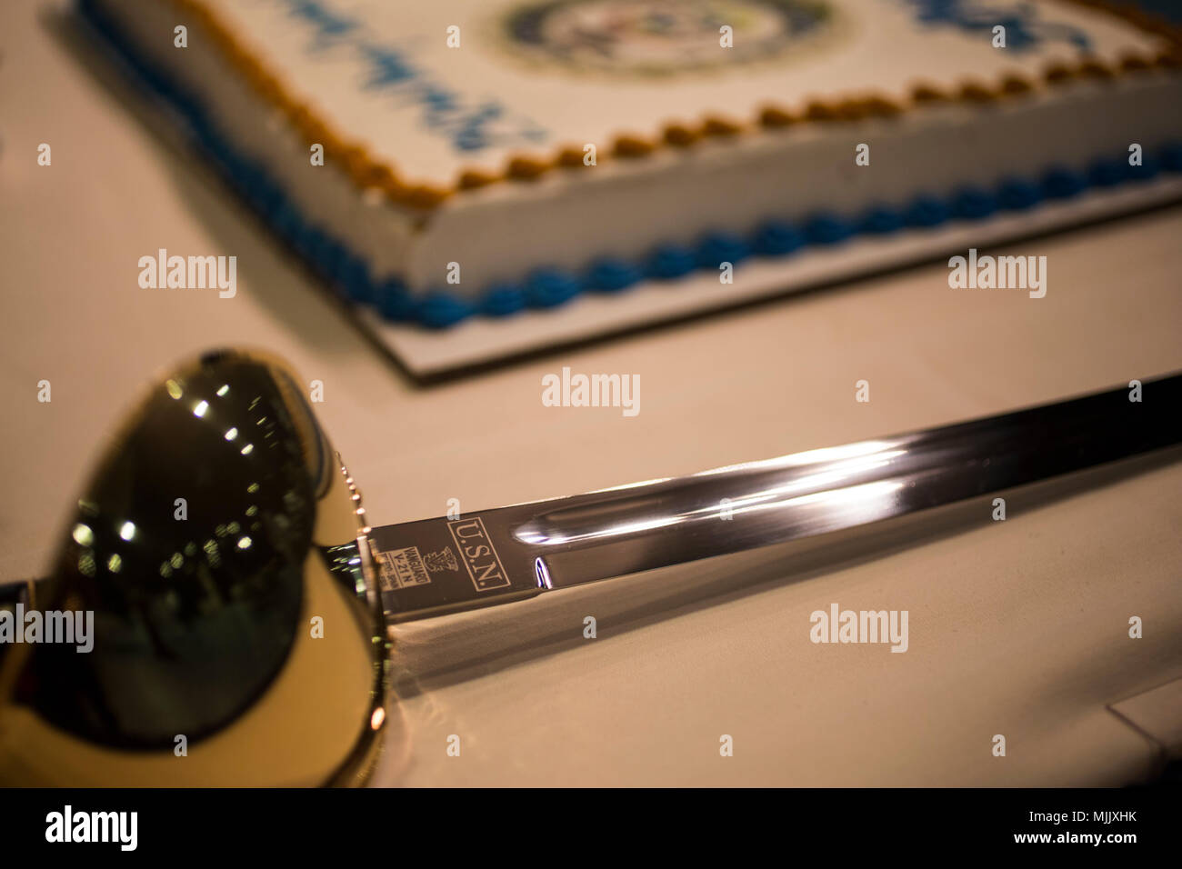 a-ceremonial-saber-is-placed-in-preparation-of-the-cake-cutting