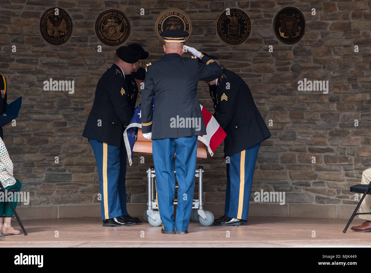 Soldiers from the West Virginia Army National Guard Honor Guard salute