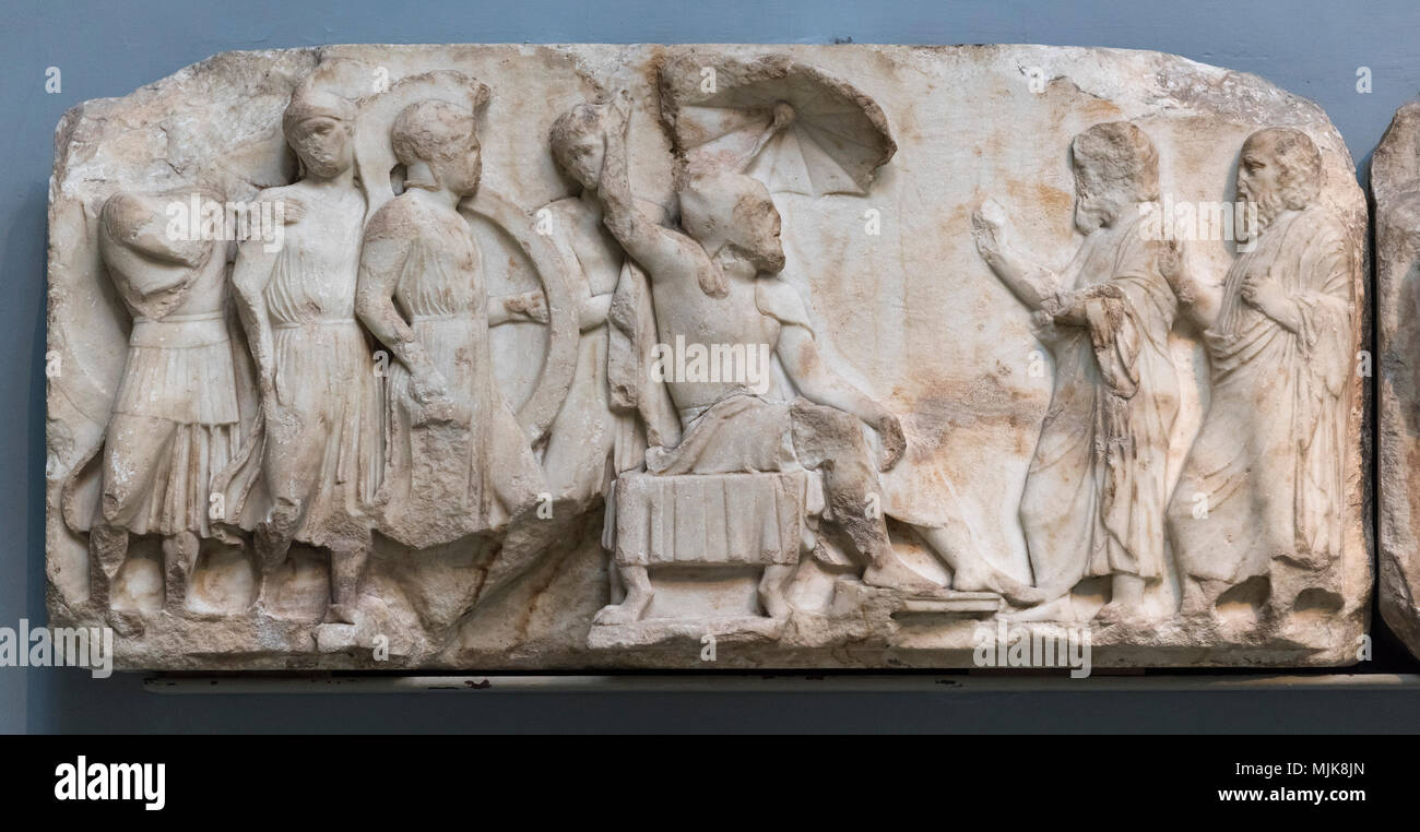 London. England. British Museum, Nereid Monument, frieze (detail), Persian satrap (possibly Arbinas, in Persian dress, receiving emissaries), from Xan Stock Photo