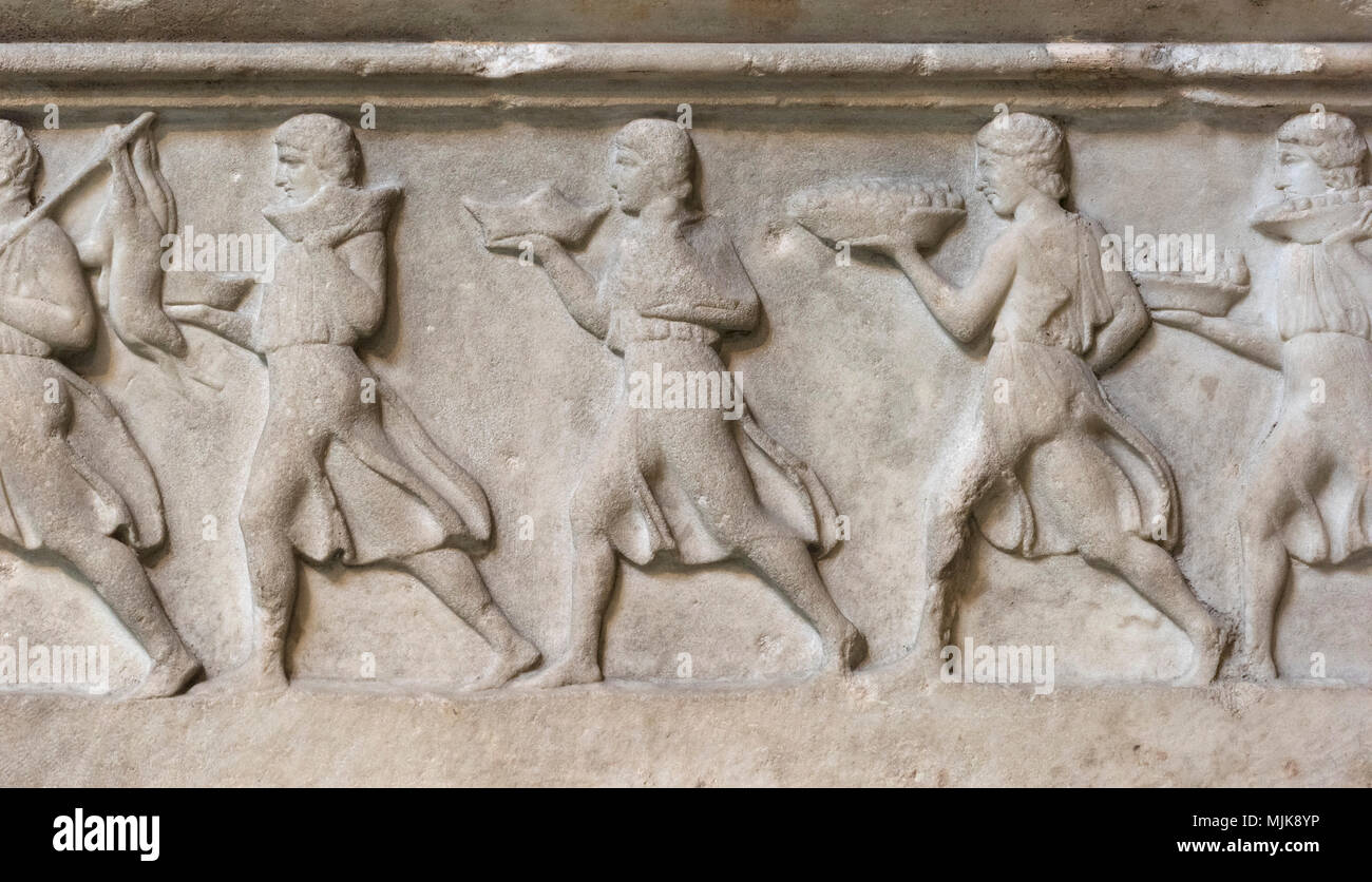 London. England. British Museum, Nereid Monument, frieze (detail), men carrying offerings, from Xanthos, Turkey, ca. 390-380 B.C.  The Nereid Monument Stock Photo