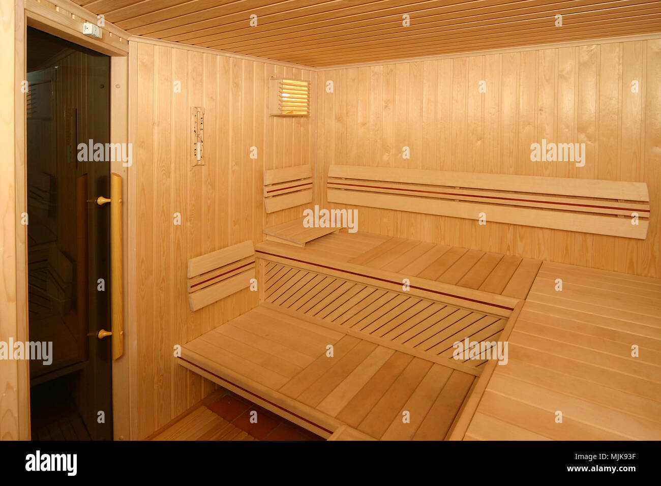 Sauna room with traditional sauna accessories Stock Photo Alamy