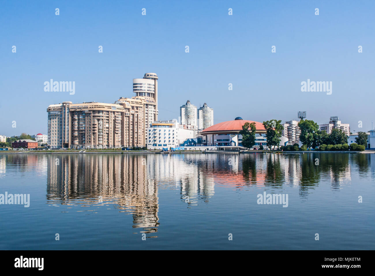 Yekaterinburg, Russia - August, 04,2016: Embankment of the city pond in center of Yekaterinburg in summer morning. Stock Photo
