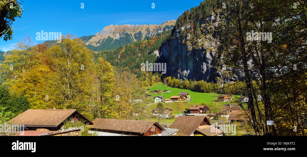 Traditional Chalets of village in Lauterbrunnen Valley at autumn ...