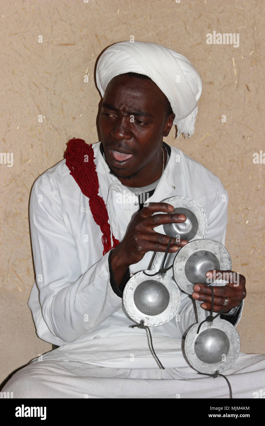 Berber Musician Playing Krakebs Stock Photo