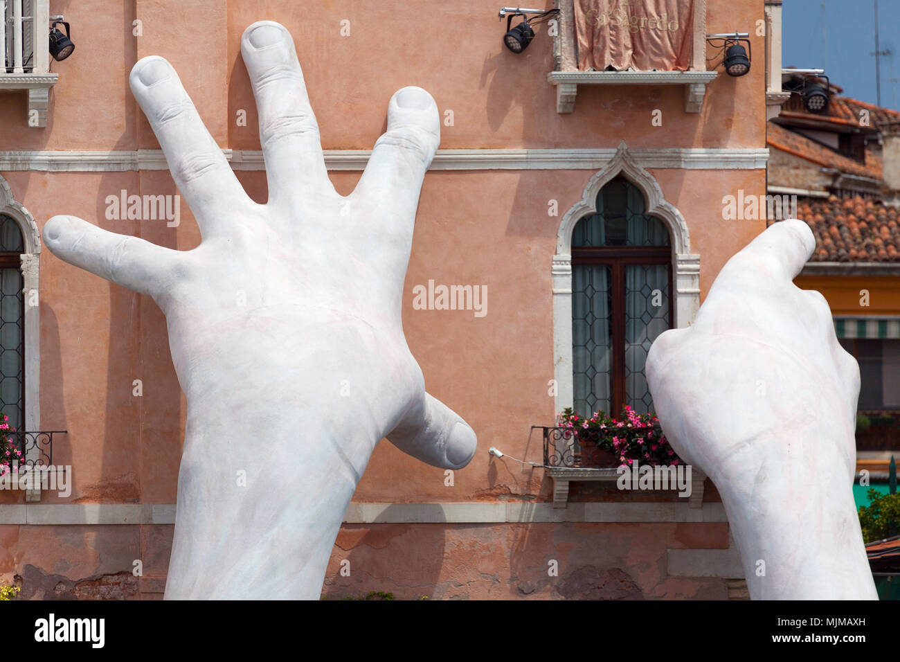 Giant hands sculpture in Venice Stock Photo