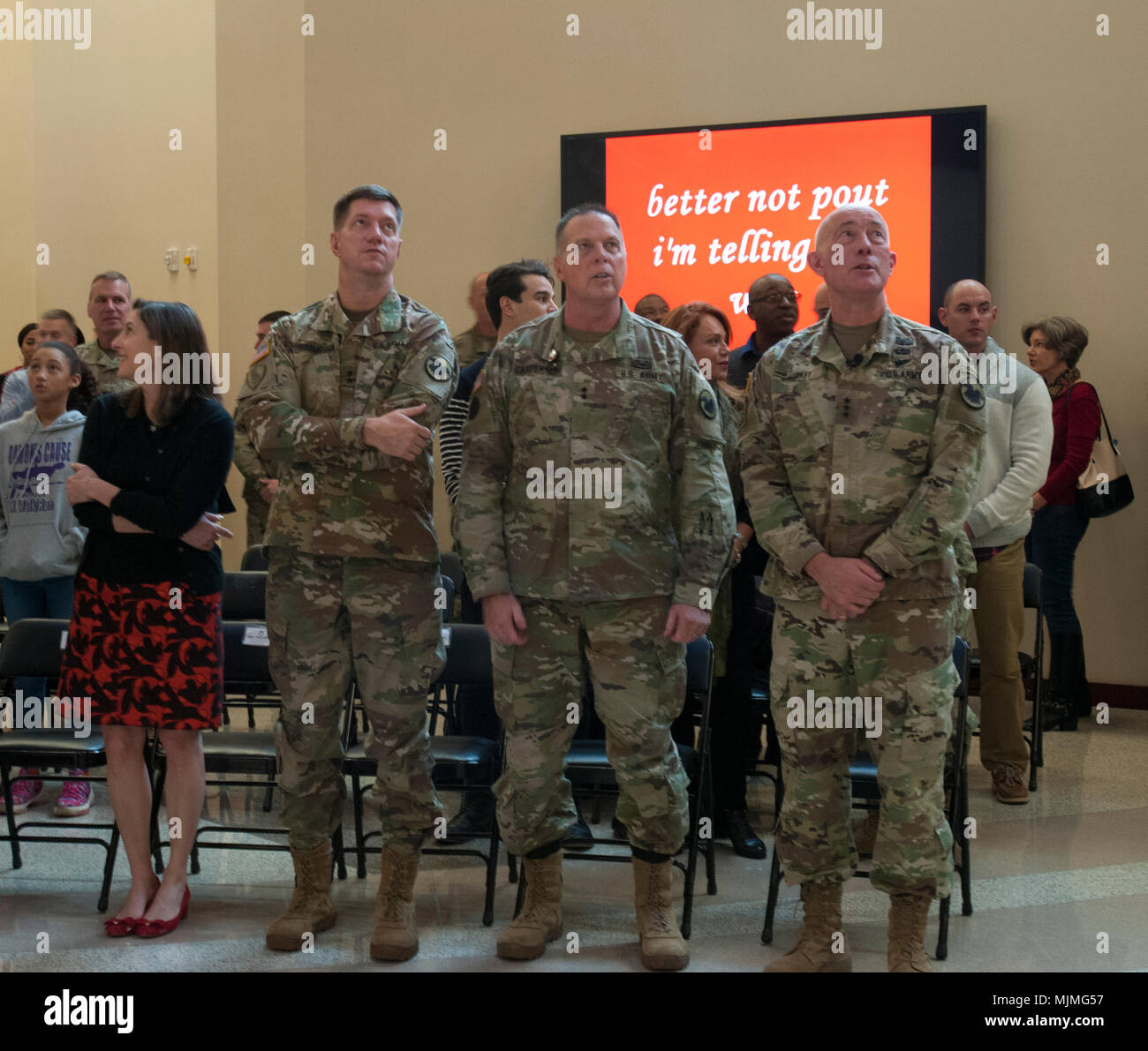 The U.S. Army Command Team, stand to sing Christmas songs during the ...
