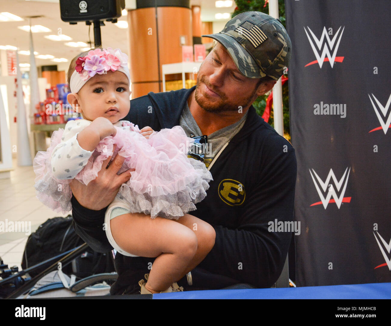 20171205-N-ZO368-030 CORONADO, Calif. (Dec. 5, 2017) WWE superstar Dolph Ziggler poses for a photo at the Navy Exchange onboard Naval Base Coronado during a Tribute to the Troops event. Tribute to the Troops is an annual event held by WWE and Armed Forces Entertainment in December during the holiday season since 2003, to honor and entertain United States Armed Forces members. U.S. Navy photo by Mass Communication Specialist 1st Class Travis Alston (Released) Stock Photo