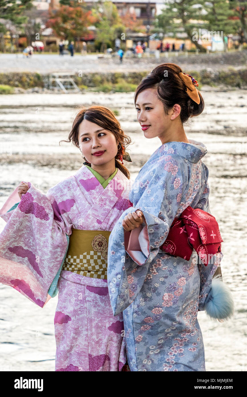 Ladies in traditional Kimono walking round streets and temple at Tenryu Shiseizen in Kyoto prefecture Japan Stock Photo