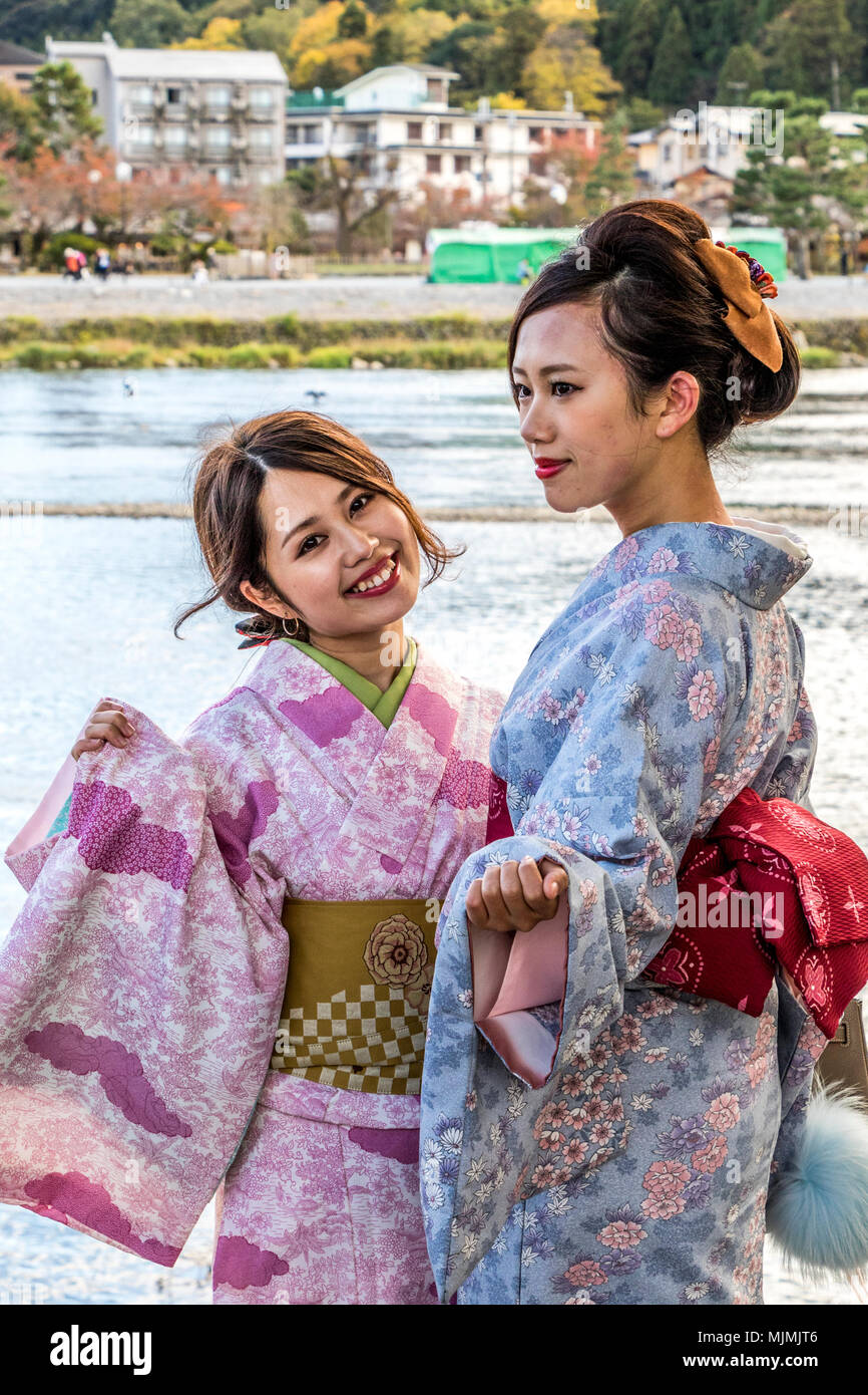 Ladies in traditional Kimono walking round streets and temple at Tenryu Shiseizen in Kyoto prefecture Japan Stock Photo