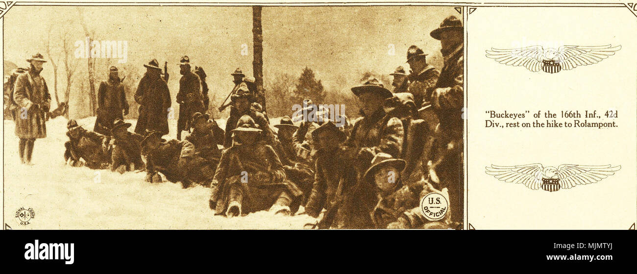 In this photo from the book 'Official Pictures of the World War' National Guard Soldiers  of Ohio's 166th Infantry Regiment of the 42nd Division make their way through the snowy French countryside during December 1917 in what became known as the 'Valley Forge Hike'. The troops marched 100 kilomters in the snow from the Vaucouleurs to Rolampont France. ( Photo provided by the New York State Military Museum) Stock Photo