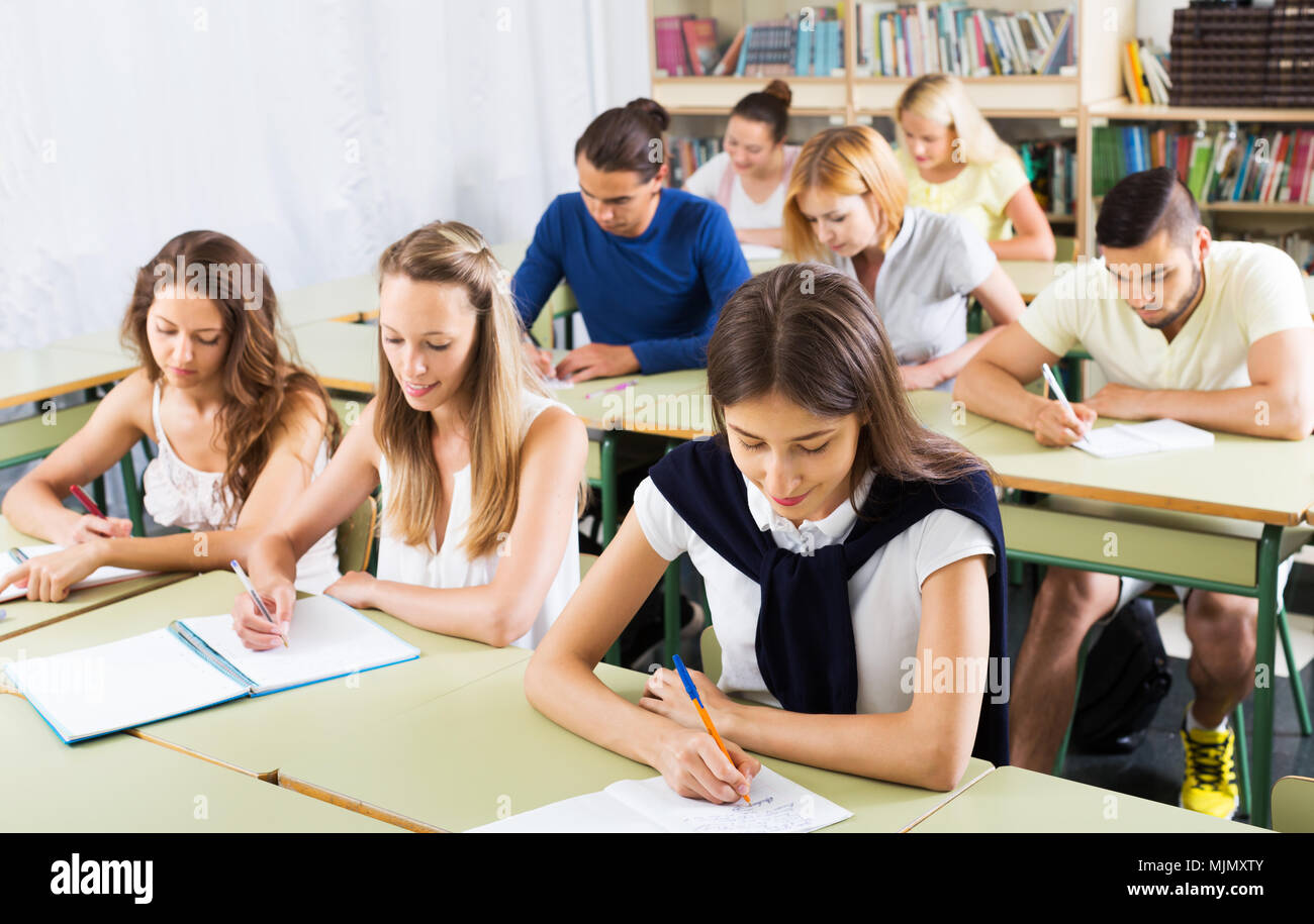 Group of caucasian students studying in the classroom interior Stock ...