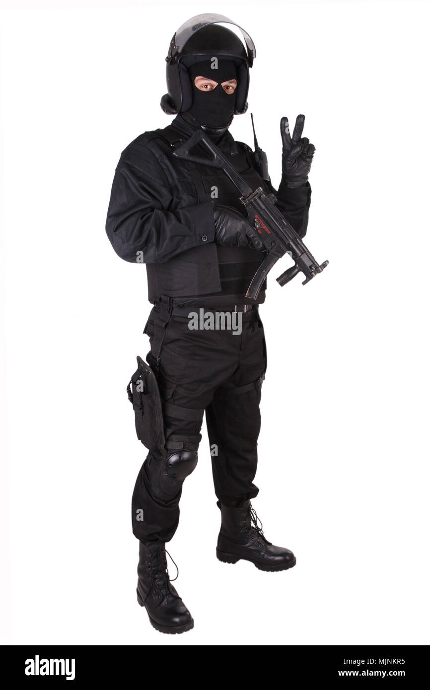 Riot police officer with weapon in black uniform isolated on white Stock  Photo - Alamy