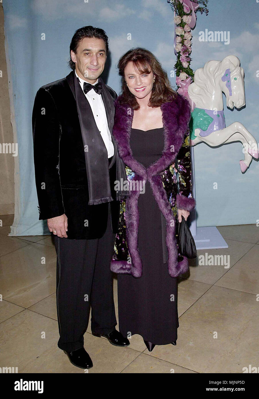 28 Oct 2000, Los Angeles, California, USA --- Original caption: The Carousel of Hope, a benefit for the Children's Diabetes Foundation was held at the Beverly Hilton, in Los Angeles. --- ' Tsuni / Bourquard 'Jacqueline Bisset with Emin Boztepe Jacqueline Bisset with Emin Boztepe Jacqueline Bisset with Emin Boztepe Event in Hollywood Life - California,  Red Carpet Event, Vertical, USA, Film Industry, Celebrities,  Photography, Bestof, Arts Culture and Entertainment, Topix  Celebrities fashion /  from the Red Carpet-1994-2000, one person, Vertical, Best of, Hollywood Life, Event in Hollywood Lif Stock Photo