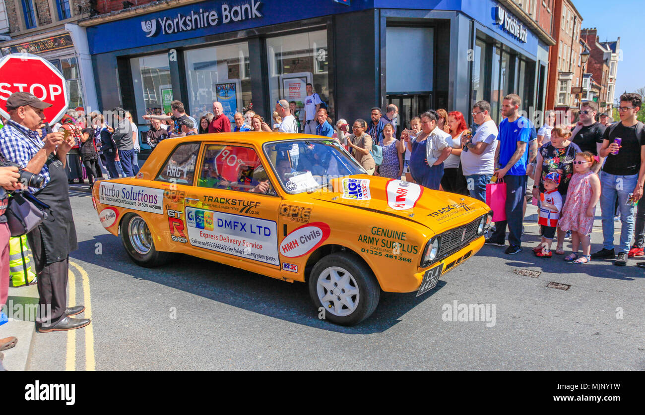 A yellow Ford Cortina at the Supercar Event,High Street,Stockton on Tees,England,UK Stock Photo