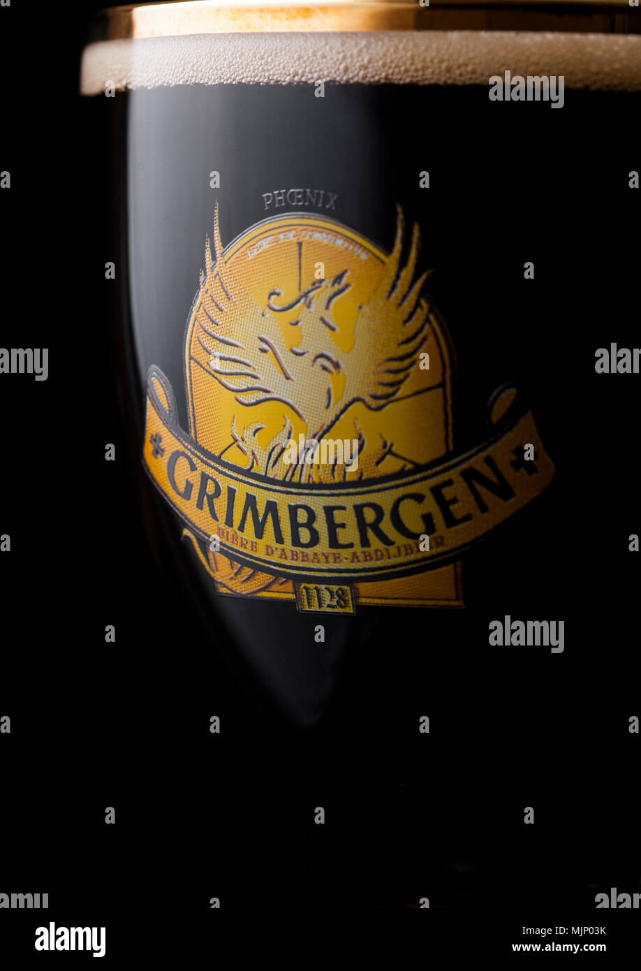 LONDON, UK - MAY 03, 2018: Cold Glass of Grimbergen dubbel beer on black  background Stock Photo - Alamy