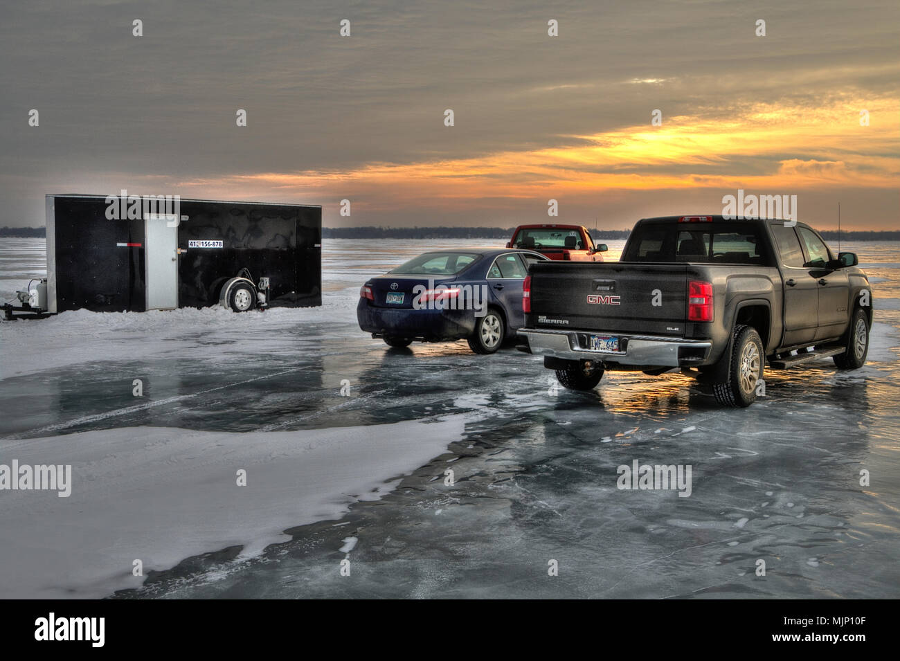 Ice Fishing houses on Frozen Ottertail Lake in Minnesota Stock Photo