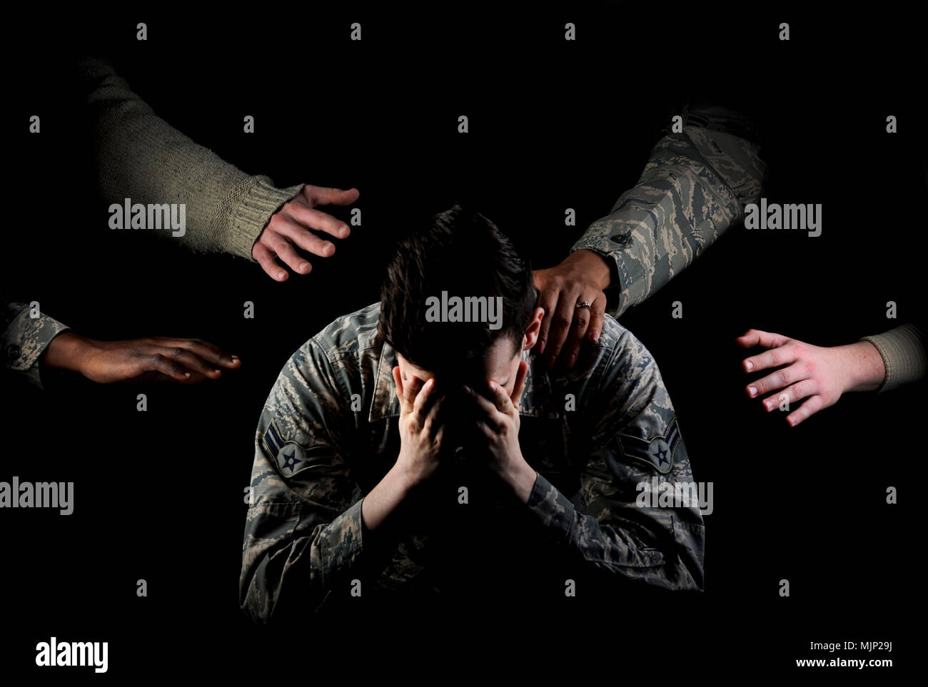 The mental health clinic offers many services on base including substance abuse support for active duty only, domestic violence and child abuse prevention and various classes for active duty and civilians. Armed Forces and civilians displaying courage bravery dedication commitment and sacrifice Stock Photo