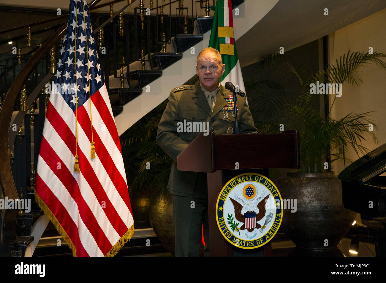 U.S. Marine Gen. Robert B. Neller Commandant of the Marine Corps speaks to military leaders from several partner nations during a dinner at the residence of U.S. Ambassador Roberta S. Jacobson in Mexico City, Mexico on March 13, 2018. MLAC was held from March 11 through the 16th and incorporated numerous Marine leaders throughout Latin America. Armed Forces and civilians displaying courage bravery dedication commitment and sacrifice Stock Photo