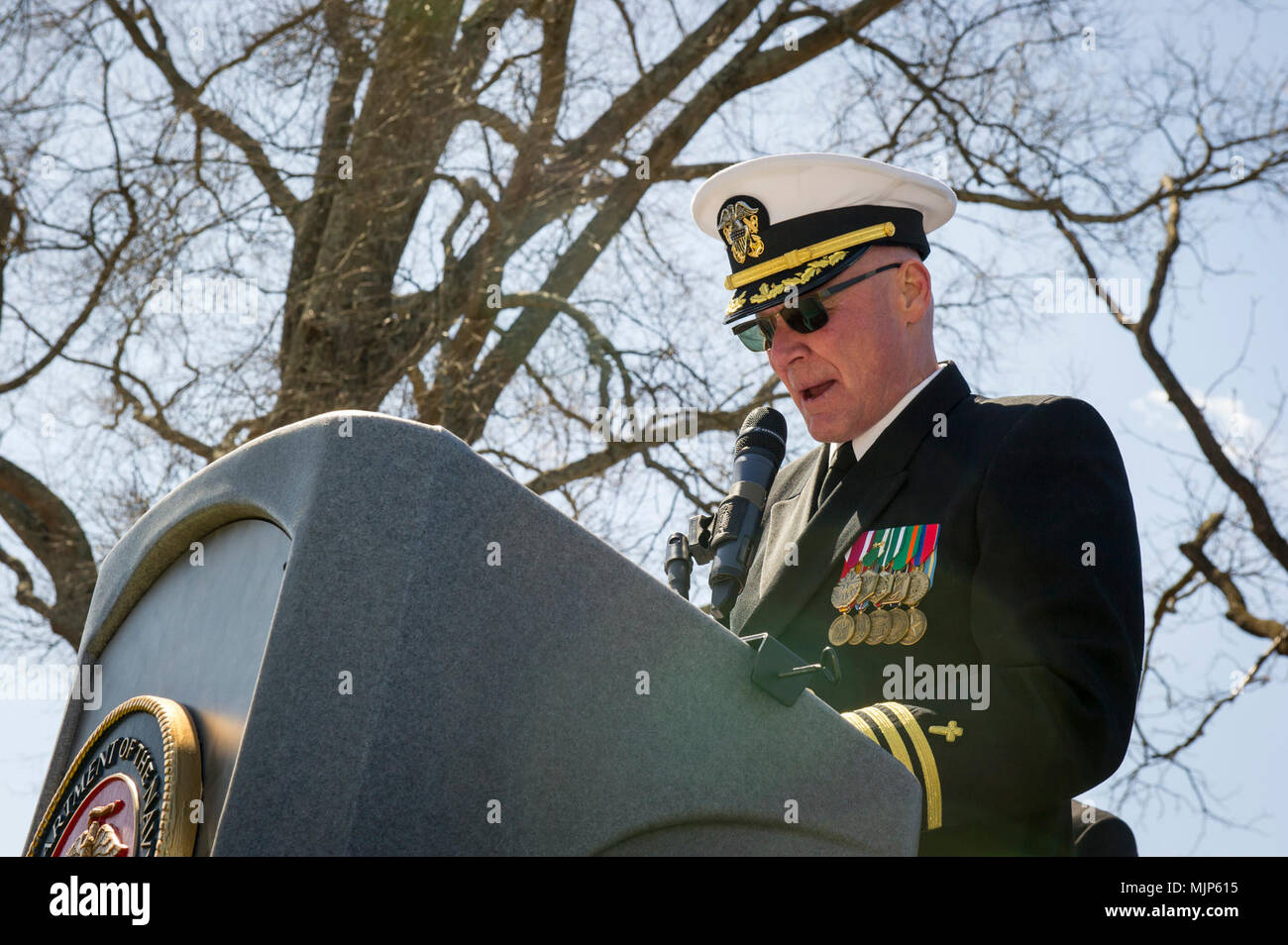 U.S. Navy Chaplain Stephen Barstow, commander, gives the invocation during the Presidential wreath laying ceremony held to honor the 4th President of the United States, James Madison, also known as the Father of the Constitution, at his home at Montpelier, Orange, Va., March 16, 2018. This event was held in commemoration of the 267th anniversary of the birth of Madison, born in 1751, and has also been decreed as James Madison Appreciation Day for the Commonwealth of Virginia. Armed Forces and civilians displaying courage bravery dedication commitment and sacrifice Stock Photo