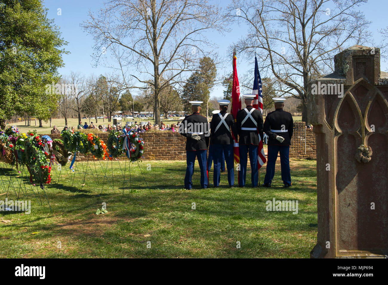 U.S. Marines with Marine Corps Base Quantico Color Guard stand at parade rest during the Presidential wreath laying ceremony held to honor the 4th President of the United States, James Madison, also known as the Father of the Constitution, at his home at Montpelier, Orange, Va., March 16, 2018. This event was held in commemoration of the 267th anniversary of the birth of Madison, born in 1751, and has also been decreed as James Madison Appreciation Day for the Commonwealth of Virginia. Armed Forces and civilians displaying courage bravery dedication commitment and sacrifice Stock Photo