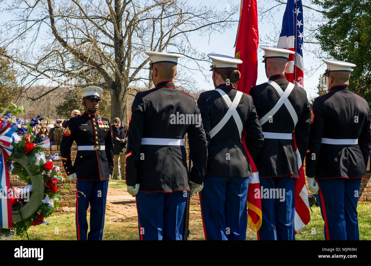 U.S. Marines with Marine Corps Base Quantico Color Guard stand at attention during the Presidential wreath laying ceremony held to honor the 4th President of the United States, James Madison, also known as the Father of the Constitution, at his home at Montpelier, Orange, Va., March 16, 2018. This event was held in commemoration of the 267th anniversary of the birth of Madison, born in 1751, and has also been decreed as James Madison Appreciation Day for the Commonwealth of Virginia. Armed Forces and civilians displaying courage bravery dedication commitment and sacrifice Stock Photo