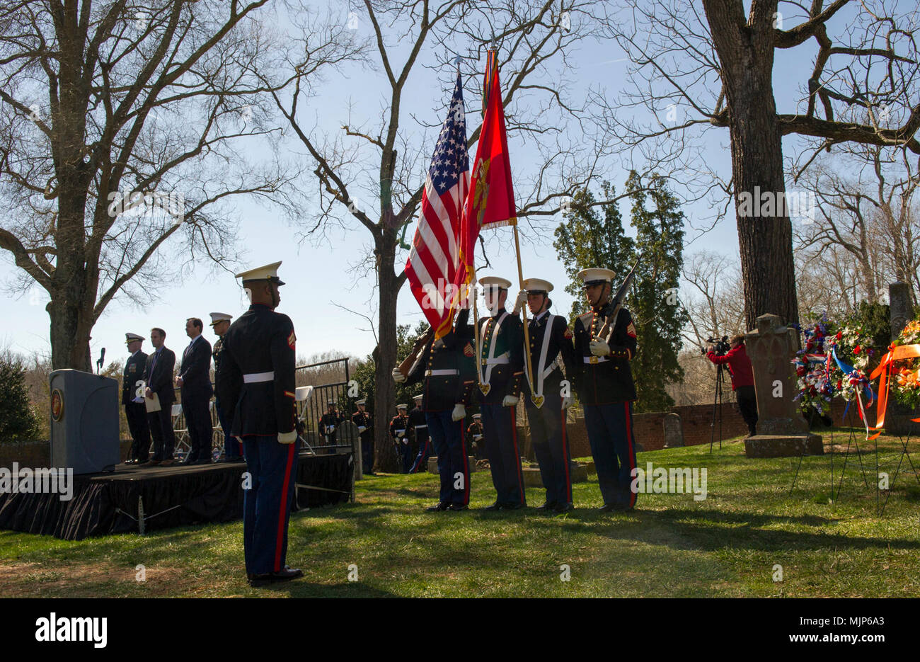 U.S. Marines with Marine Corps Base Quantico stand at the position of attention during the Presidential wreath laying ceremony honoring the 4th President of the United States, James Madison, also known as the Father of the Constitution, at his home at Montpelier, Orange, Va., March 16, 2018. This event was held in commemoration of the 267th anniversary of the birth of Madison, born in 1751, and has also been decreed as James Madison Appreciation Day for the Commonwealth of Virginia. Armed Forces and civilians displaying courage bravery dedication commitment and sacrifice Stock Photo