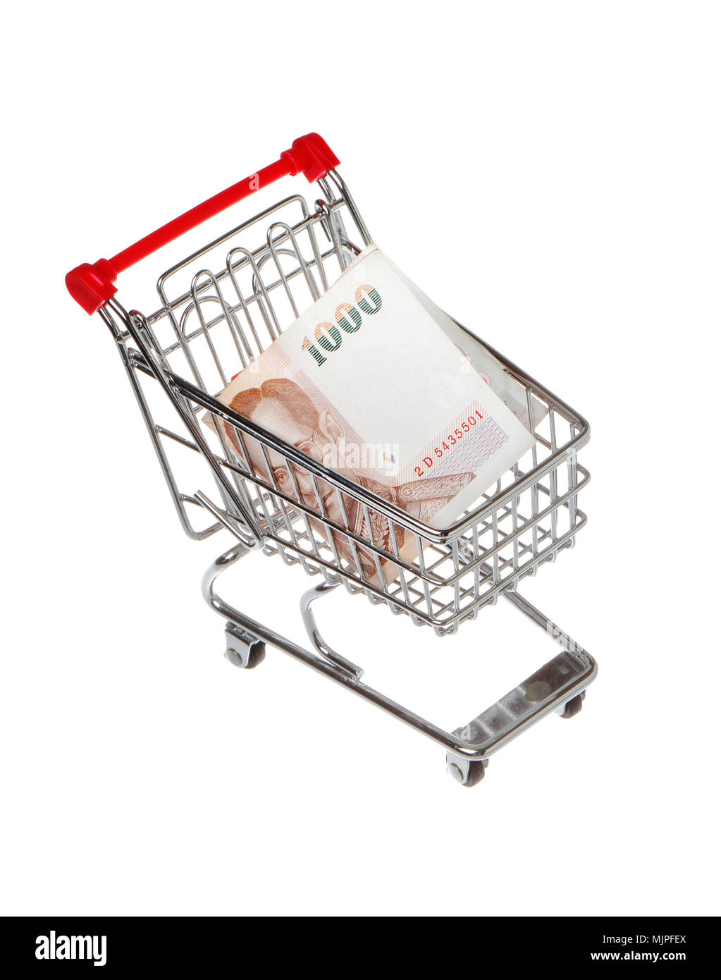 One small shopping cart containing a 1000 Thai baht bill isolated on white. Stock Photo