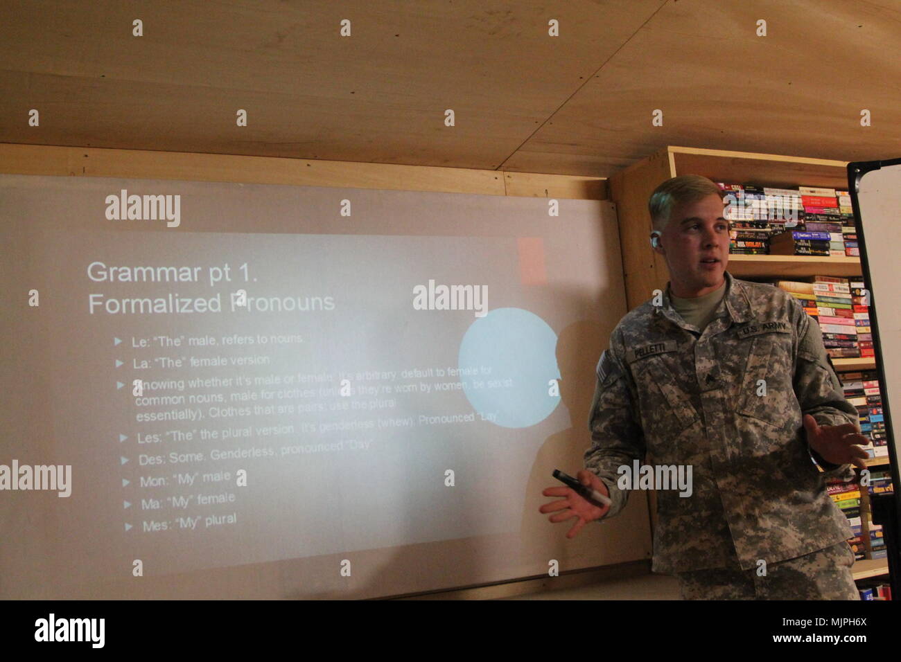 Sgt. Nathan Pelletti, of the 40th Expeditionary Signal Battalion, 11th Theater Tactical Signal Brigade, teaches a French class at Contingency Location Garoua, Cameroon, as part of Task Force Darby, Dec. 18. TF Darby soldiers are serving in a support role for the Cameroon military’s fight against the violent extremist organization Boko Haram. (Photo by Staff Sgt. Christina J. Turnipseed, Contingency Location Garoua Public Affairs) Stock Photo