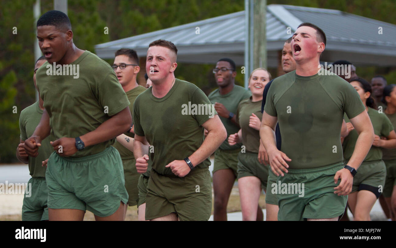 U.S. Marines attending Personnel Administration School, call cadence during a command run at Camp Johnson, N.C., Dec. 15, 2017. The purpose of the command run was to build unit cohesion and camaraderie.  (U.S. Marine Corps photo by Lance Cpl. Tyler Pender) Stock Photo