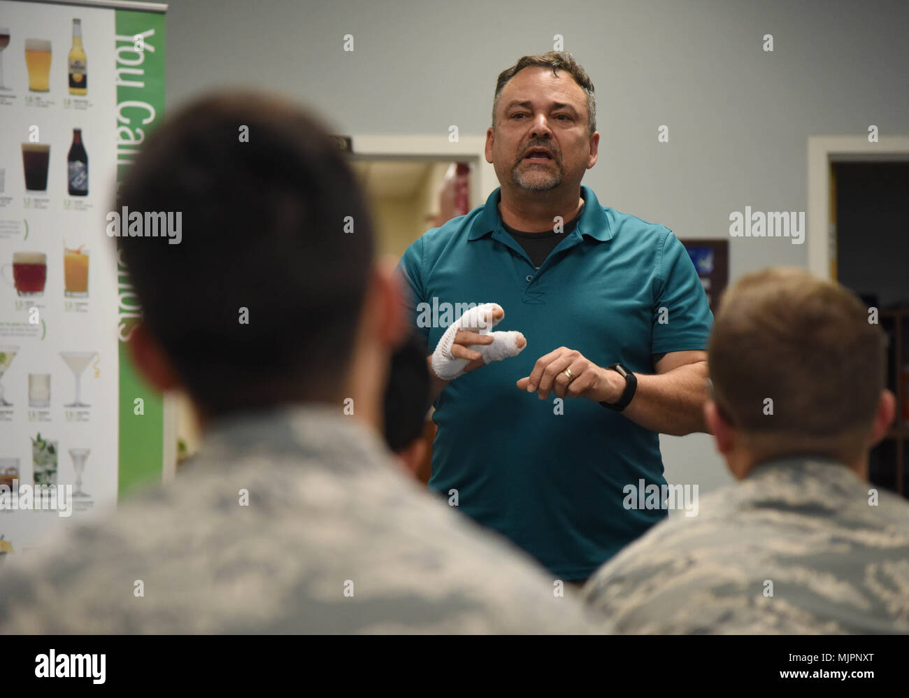 Paul Ahlberg, 81st Medical Operations Squadron certified alcohol drug counselor, speaks to Airmen about alcohol awareness at the 81st Communications Squadron Dec. 19, 2017, on Keesler Air Force Base, Mississippi. December is Impaired Driving Awareness Month. More than 200 people were killed in Mississippi last year in drunk driving related incidents. (U.S. Air Force photo by Kemberly Groue) Stock Photo