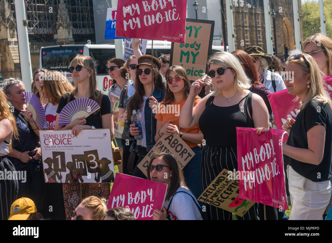 London, UK. 5th May 2018. Women in the abortion rights campaign hold a rally in Parliament Square before the annual March for Life UK by pro-life anti-abortion campaigners was to march to a rally there. They insisted on the right for women to choose and opposed to any increase of restrictions which would lead to the problems we saw before the 1967 Abortion Act, when women risked their lives in back street abortions. They called for women in Northern Ireland to be given the same rights as in the rest of the UK and for an end of the harassment of women going into clinics, and supported the Irish Stock Photo