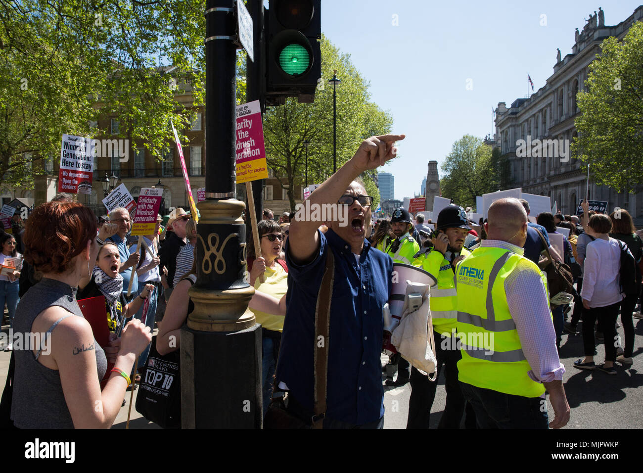 London, UK. 5th May, 2018. Pro-lifers taking part in the first UK March for Life through central London are contested by pro-choice supporters attending the March for Windrush as they pass in front of Downing Street. Credit: Mark Kerrison/Alamy Live News Stock Photo