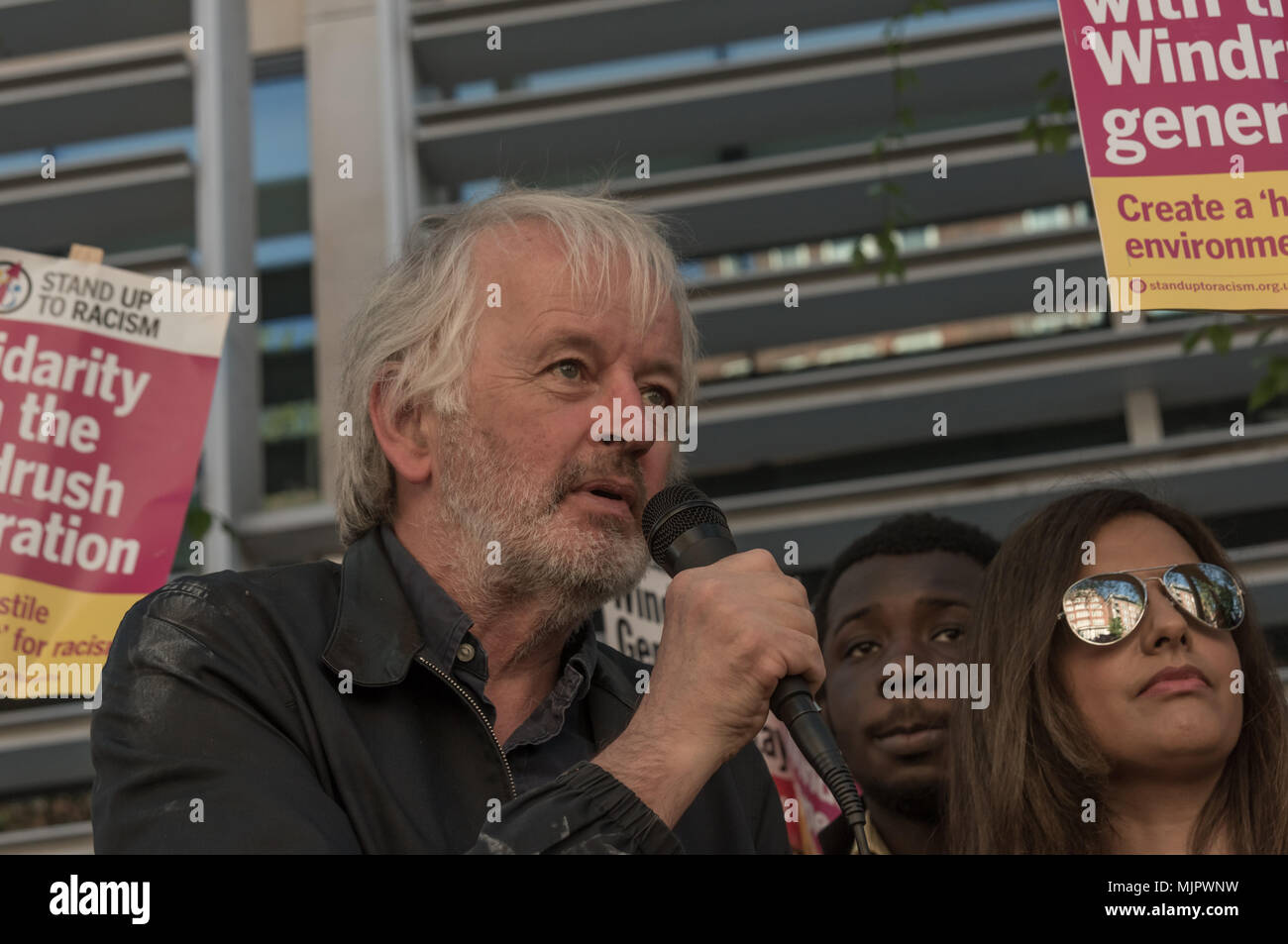 London, UK. 5th May 2018. Steve Hart, Unite Against Fascism speaks at the protest outside the Home Office calling for Theresa May's racist 2014 Immigration Act to be repealed and an immediate end to the deportation and detention of Commonwealth citizens, with those already deported to be bought back to the UK. There should be an end to the 'hostile environment' for all Credit: Peter Marshall/Alamy Live News Stock Photo