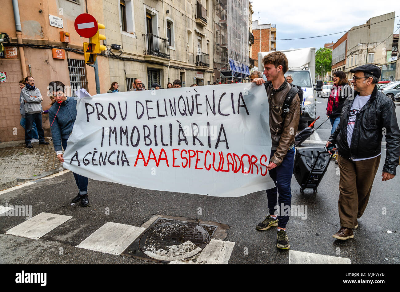 People Seen Holding A Banner Written On It Enough Of Real Estate
