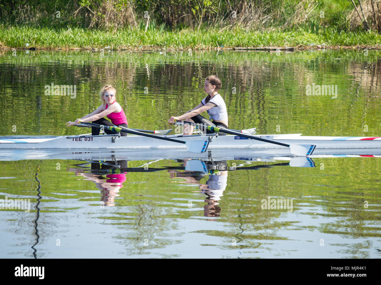Stockton on Tees, north east  England, UK. Members of Tees Rowing Club out on the river Tees on a sunny day Stock Photo