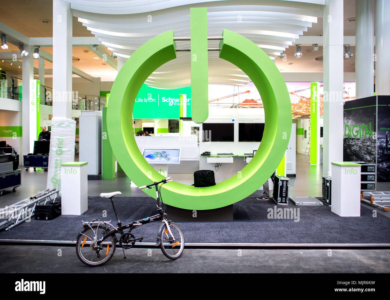 22 April 2018, Germany, Hanover A green Power symbol at the Schneider
