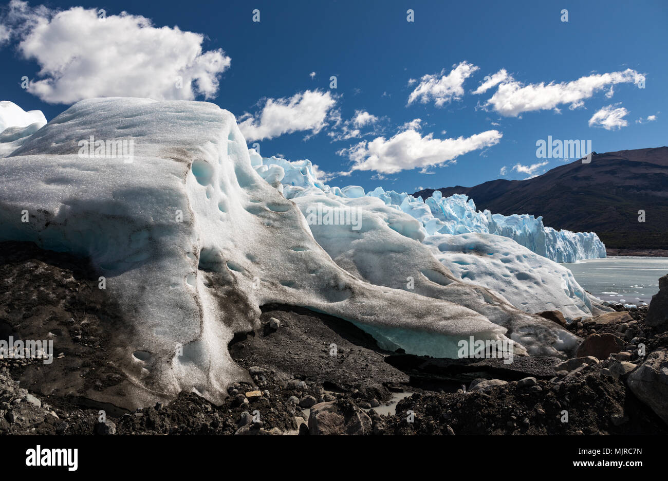 El Calyfate, Argentina - December 14, 2016: A man in sunglasses and hat looks out over the Perito Moreno Glacier at the start of a hike on the ice Stock Photo