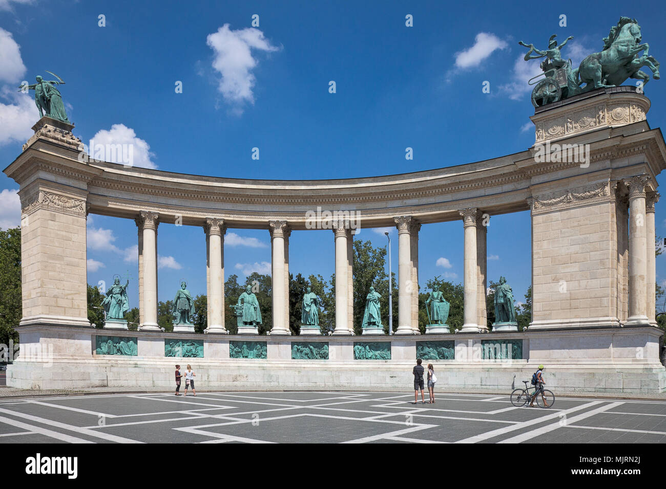 Statues of seven kings of Hungary stand in the left colonnade of the