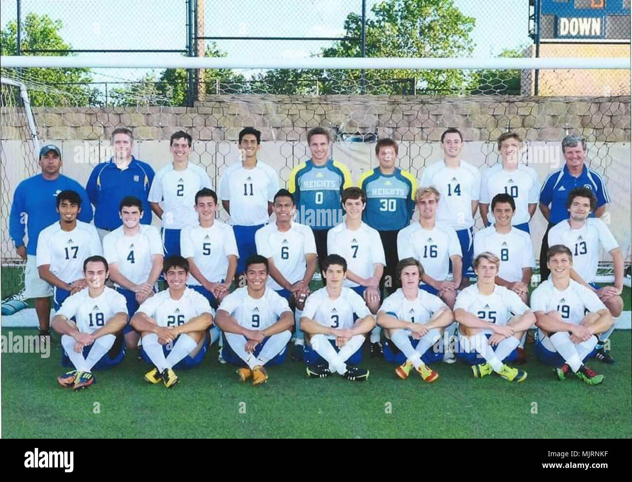 Hernando Ortega, top row, third from the left, gathers for a photo with his fellow teammates before a match as part of the San Antonio Alamo Heights High School soccer team in Corpus Christi, Texas, April 13, 2012. Ortega and his teammates would go on to become state champions that year. Now a satellite systems operator with the 4th Space Communications Squadron, Ortega has been able to balance both service and his passion for the sport. Armed Forces and civilians displaying courage bravery dedication commitment and sacrifice Stock Photo