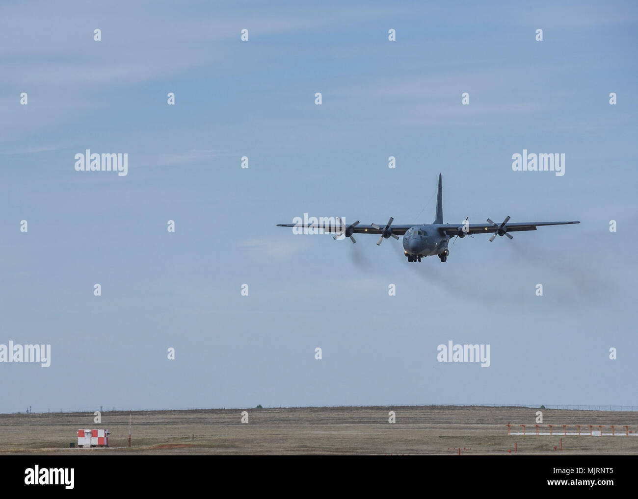A Lockheed MC-130P Combat Shadow prepares to land at Sheppard Air Force Base, Texas, March 21, 2018. This particular MC-130 was has been in service since 1975. The aircraft's days of flying rescue missions and snagging film canisters jettisoned from satellites are over now though. Now it will be used as a tool for future crew chief and armament Airmen to hone their skills. Armed Forces and civilians displaying courage bravery dedication commitment and sacrifice Stock Photo