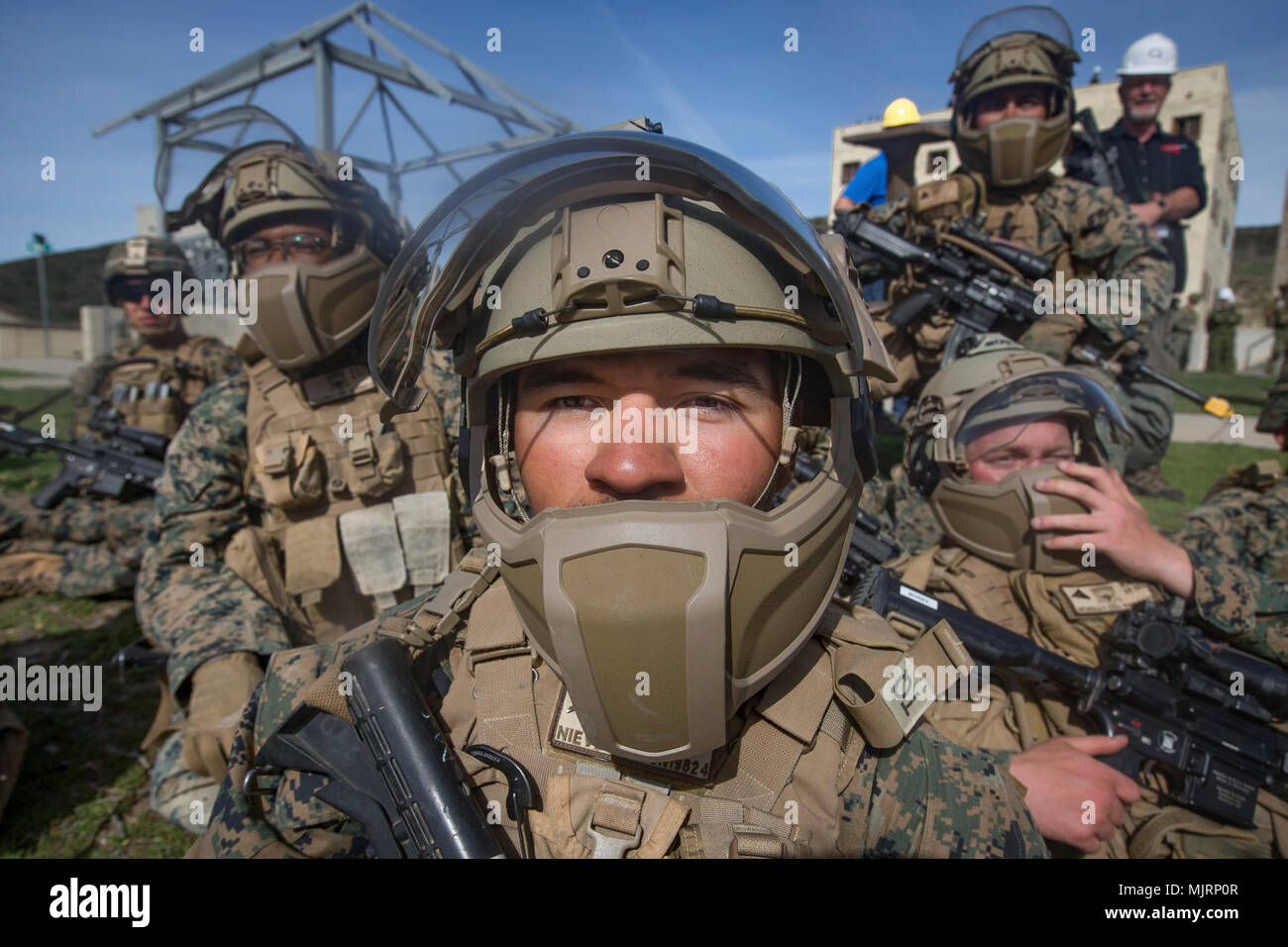 U.S. Marine Corps Lance Cpl. Jose Nieves, an infantryman with 3rd Battalion, 4th Marine Regiment, 1st Marine Division tests Step In Visor and Low Profile Mandible during Urban Advanced Naval Technology Exercise 2018 (ANTX-18) at Marine Corps Base Camp Pendleton, California, March 21, 2018. The Marines have been provided the opportunity to assess the operational utility of emerging technologies and engineering innovations that improve the Marine’s survivability, lethality and connectivity in complex urban environments. Armed Forces and civilians displaying courage bravery dedication commitment  Stock Photo