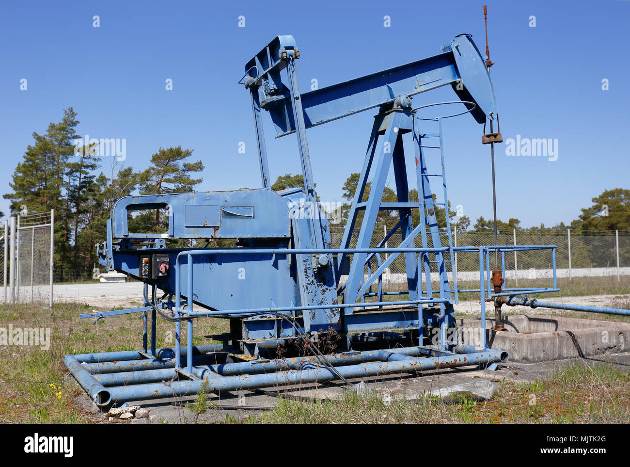 Oil pump in disused oil well near the village of Rute in the Swedish province of Gotland Stock Photo