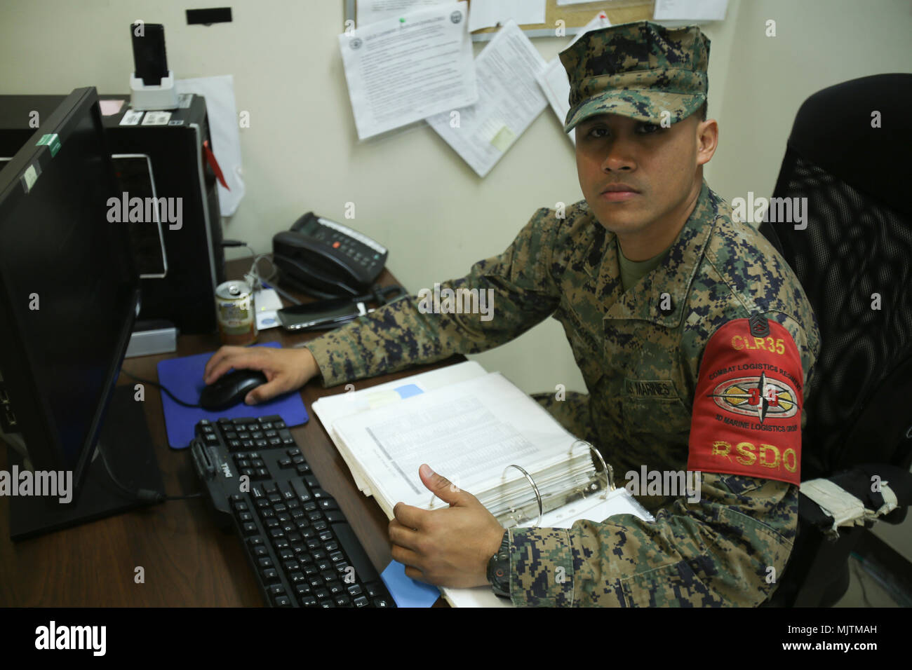 “My New Year’s resolution is to attend the first ever Kameha-con, a Dragonball Z convention in Irving, Texas, and to spend a lot of time with my family. I would like to wish my wife, Femari, a happy birthday this New Year’s, she is pregnant with our third child.” Gunnery Sgt. Jenzen Espanto is a utilities chief with 9th Engineer Support Battalion, Combat Logistics Regiment 35, and a native of Waipahu, Hawaii. (U.S. Marine Corps photo by Pfc. Jamin M. Powell) Stock Photo