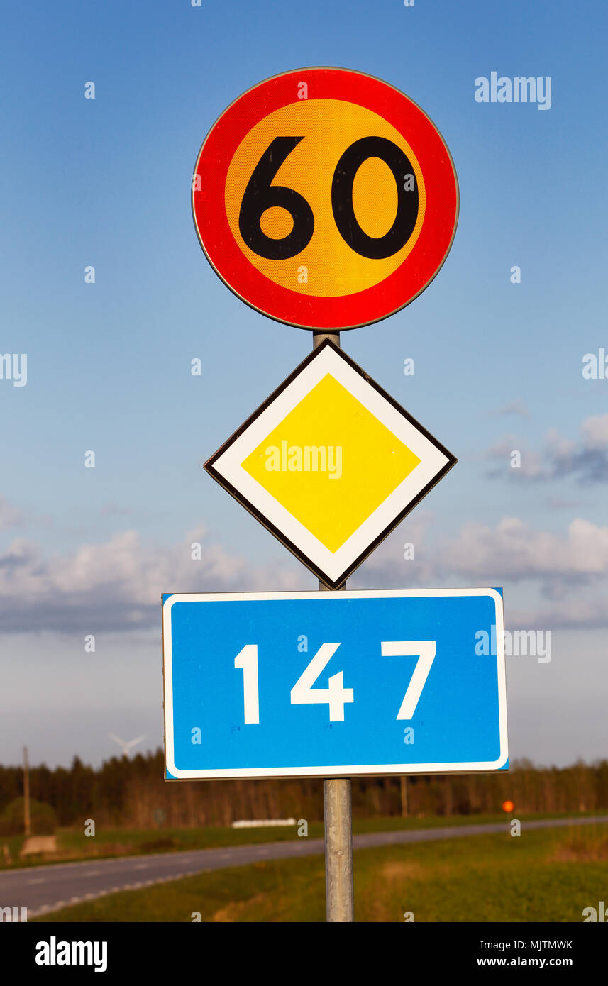 Signs for speed limit 60 kmh, primary road and road number 147 in the Swedish province of Gotland. Stock Photo