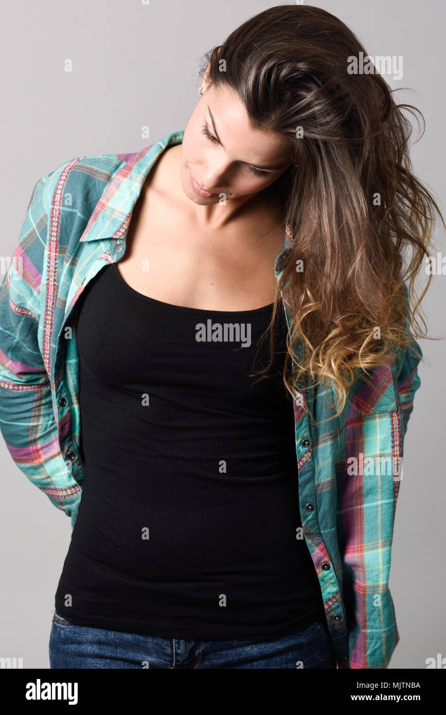 Portrait of beautiful young woman, model of fashion, wearing casual clothes. Studio shot Stock Photo