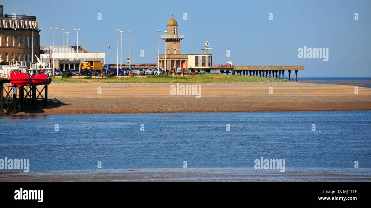 View across the River Wyre, from Knott End-on-Sea, towards the Lower Lighthouse on Fleetwood's sea front, Lancashire, UK Stock Photo