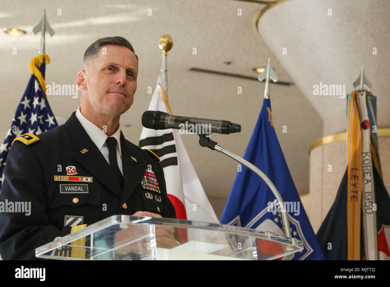 U.S Army Lt. Gen. Thomas S. Vandal commander of the Eighth Army, provides opening remarks at the Holiday concert in Seoul, Korea Dec. 17, 2017. The concert was hosted by the Eighth Army command in conjunction with local community leaders during the holiday season to promote harmonious relations between the U.S. Army and the Republic of Korea (ROK). Over 1500 U.S. Soldiers and ROK soldiers attended performances by the Eighth Army Band and the Prime Philharmonic Orchestra . (U.S. Army photo by Pfc. Edward Randolph) Stock Photo