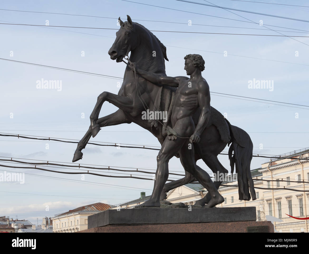 Sculpture 'A horse with a walking young man'. Anichkov Bridge, Saint Petersburg, Russia. Stock Photo